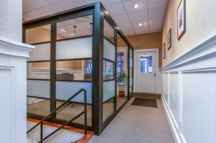 Staircase Leading to Enclosed Conference Room